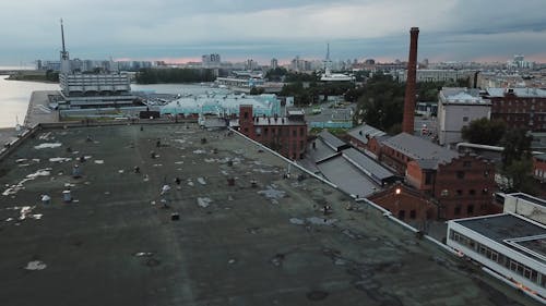 Person Skateboarding On Rooftop