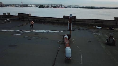 Man Dancing Hip-Hop On Rooftop