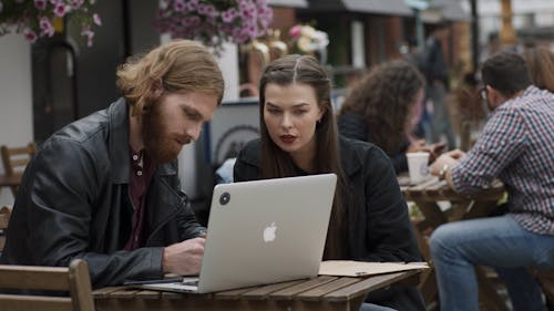 A Man And A Woman Having A Discussion 