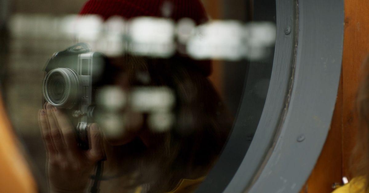Reflection In The Window Of A Woman Taking Photo Free Stock Video ...