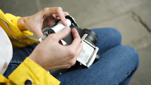 Woman Fixing Her Camera