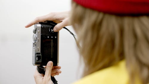 Woman Setting Her Camera