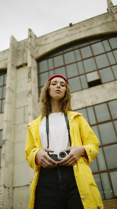 Low Angle Shot Of A Woman Taking Photo