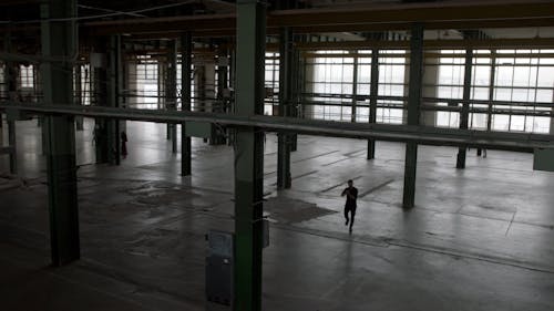 Man Dancing Inside A Building