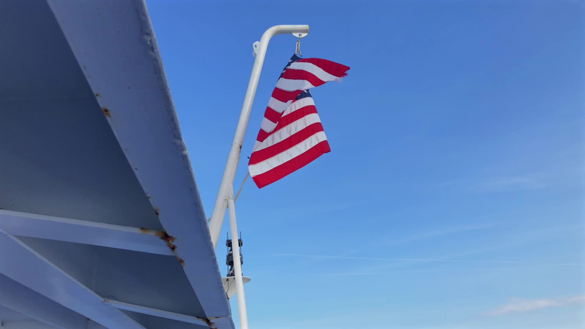 The american flag flies on the bow of a ship Free Stock Video Footage ...