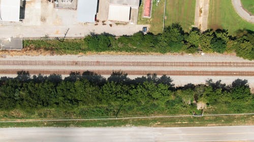 A Cargo Train Travelling On A Rail Tracks