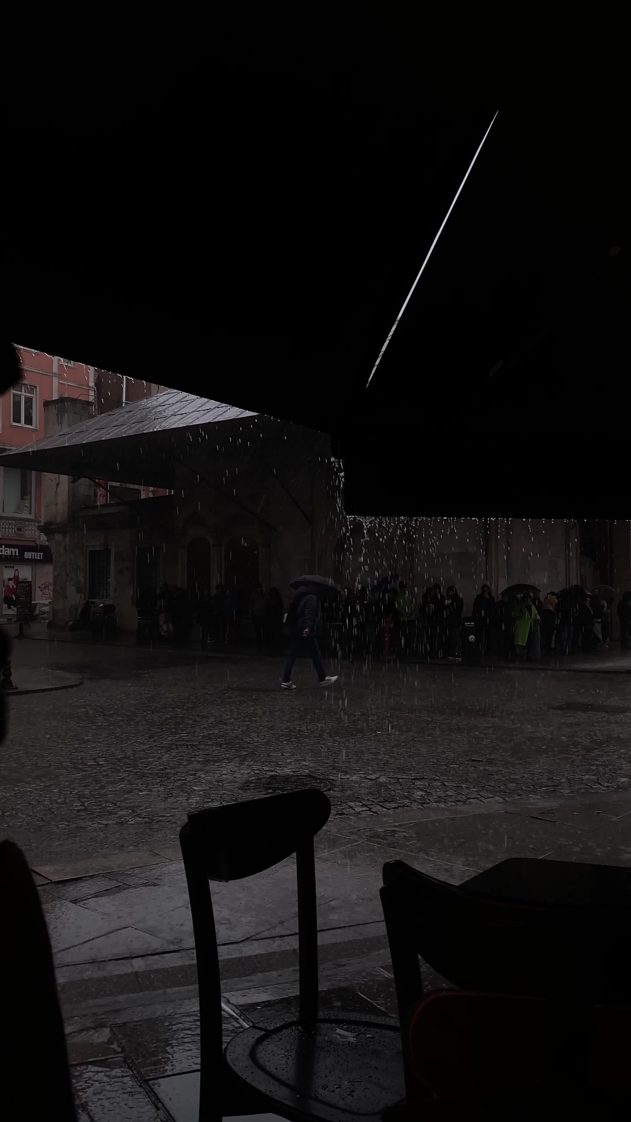 A car is parked in the rain on a street Free Stock Video Footage ...