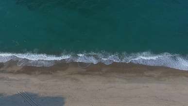 drone footage of a beach coastline