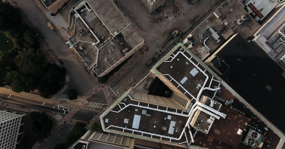 Building Rooftop View View From Above Of Building Rooftops In A City · Free Stock Video