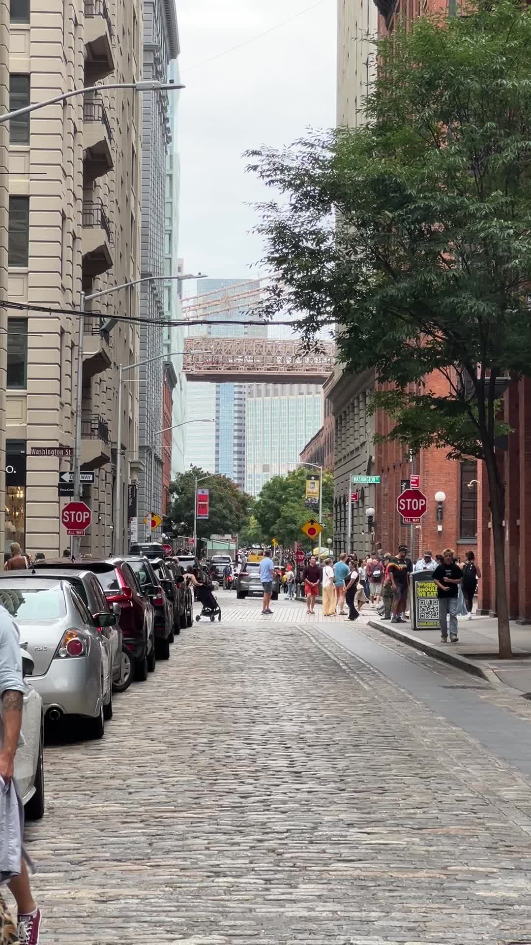 A city street with cars parked on both sides Free Stock Video Footage ...