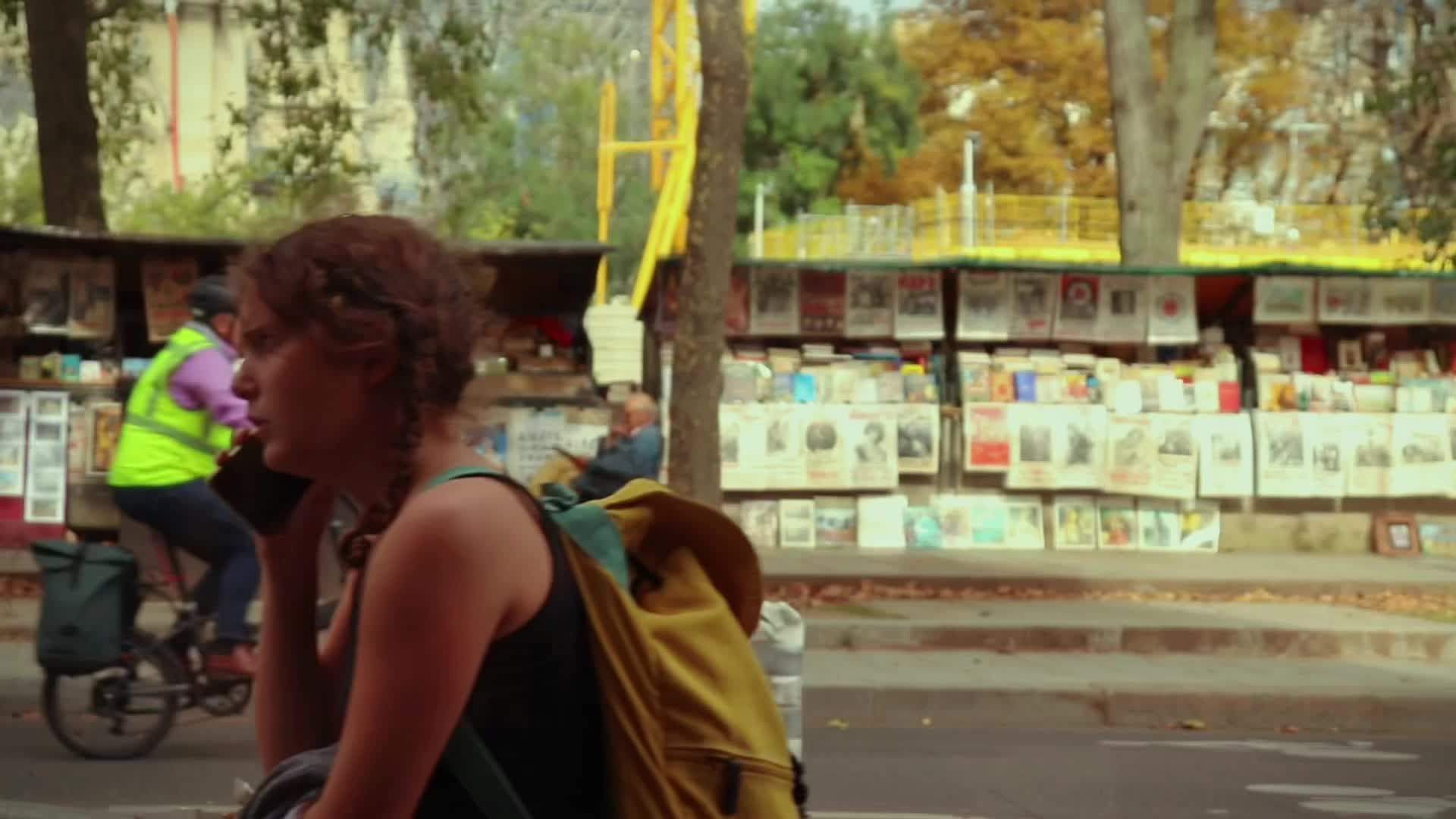 A man sitting on a bench reading a newspaper Free Stock Video Footage ...