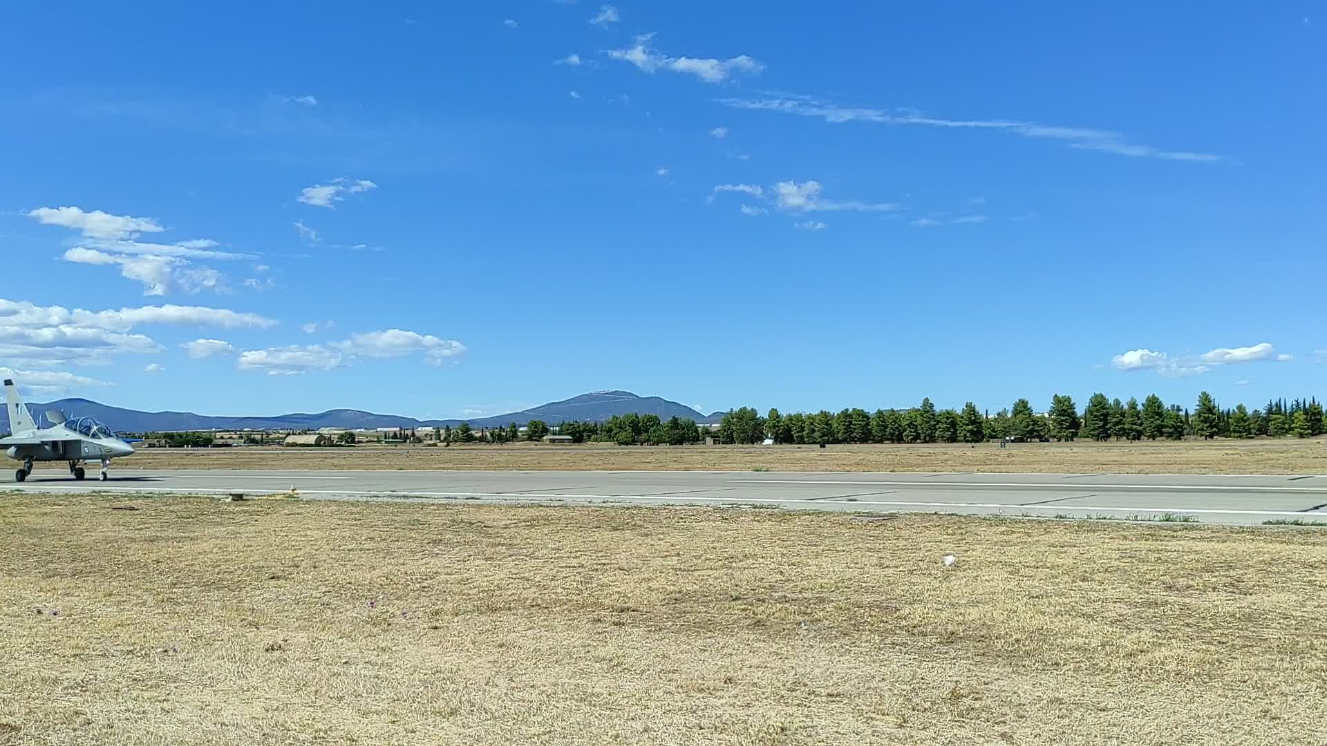 A fighter jet sits on the tarmac at an airport Free Stock Video Footage ...