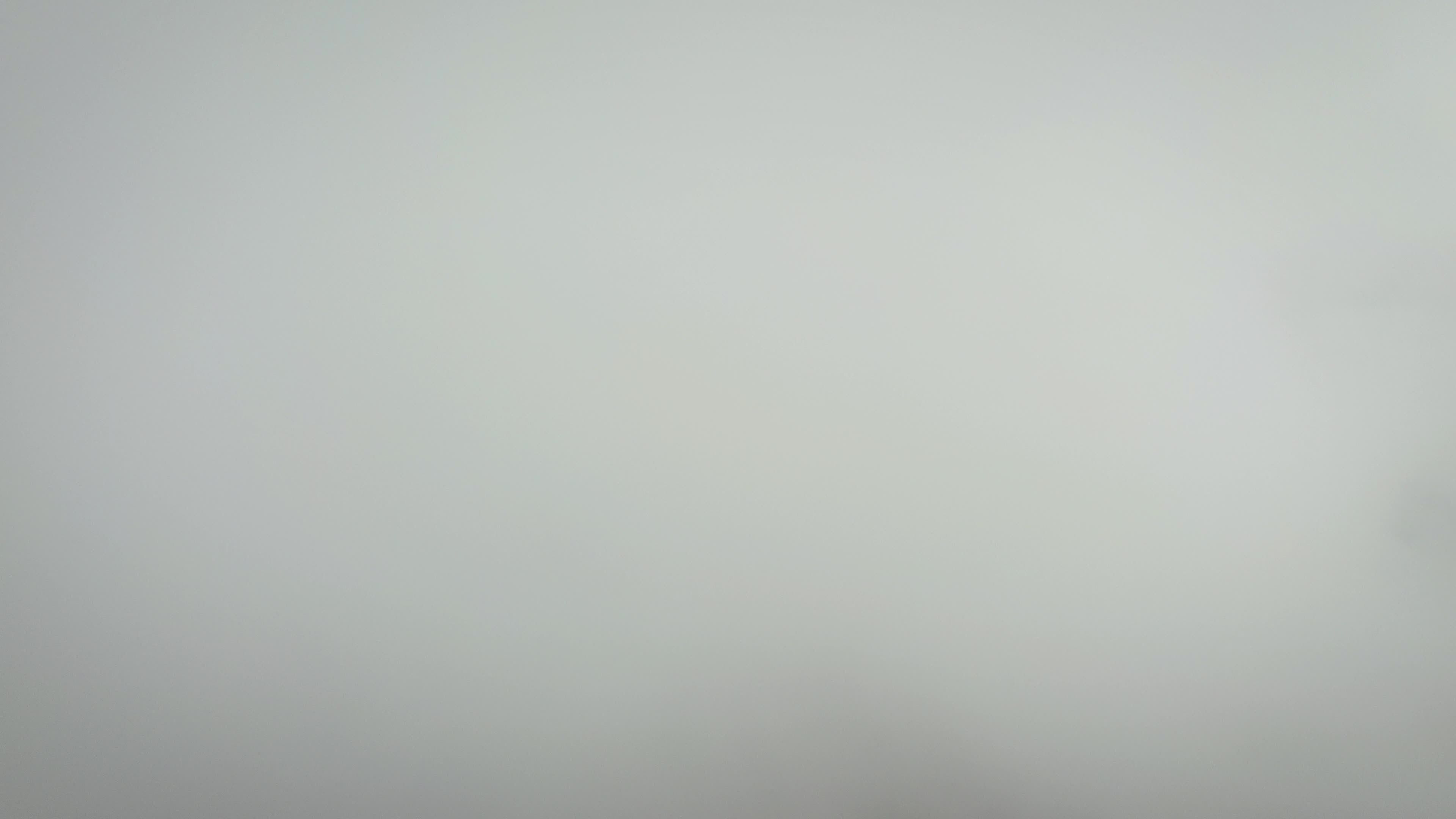 aerial view through clouds over green hills 28499216 — free pexels stock footage
