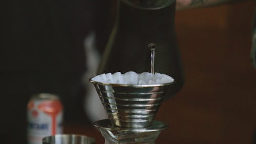 Pouring Hot Water To Make Coffee