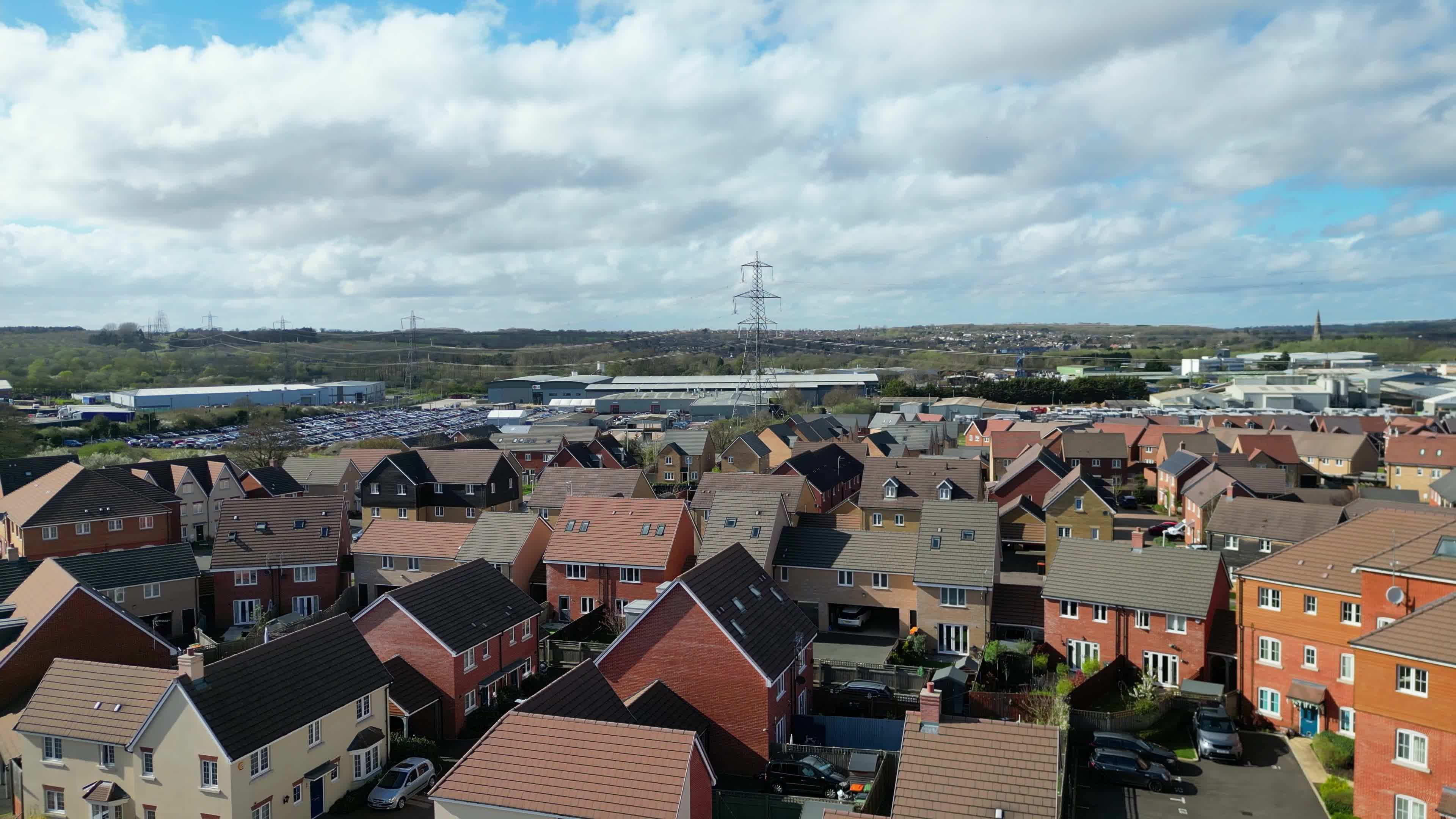 an aerial view of houses and a road 28518720