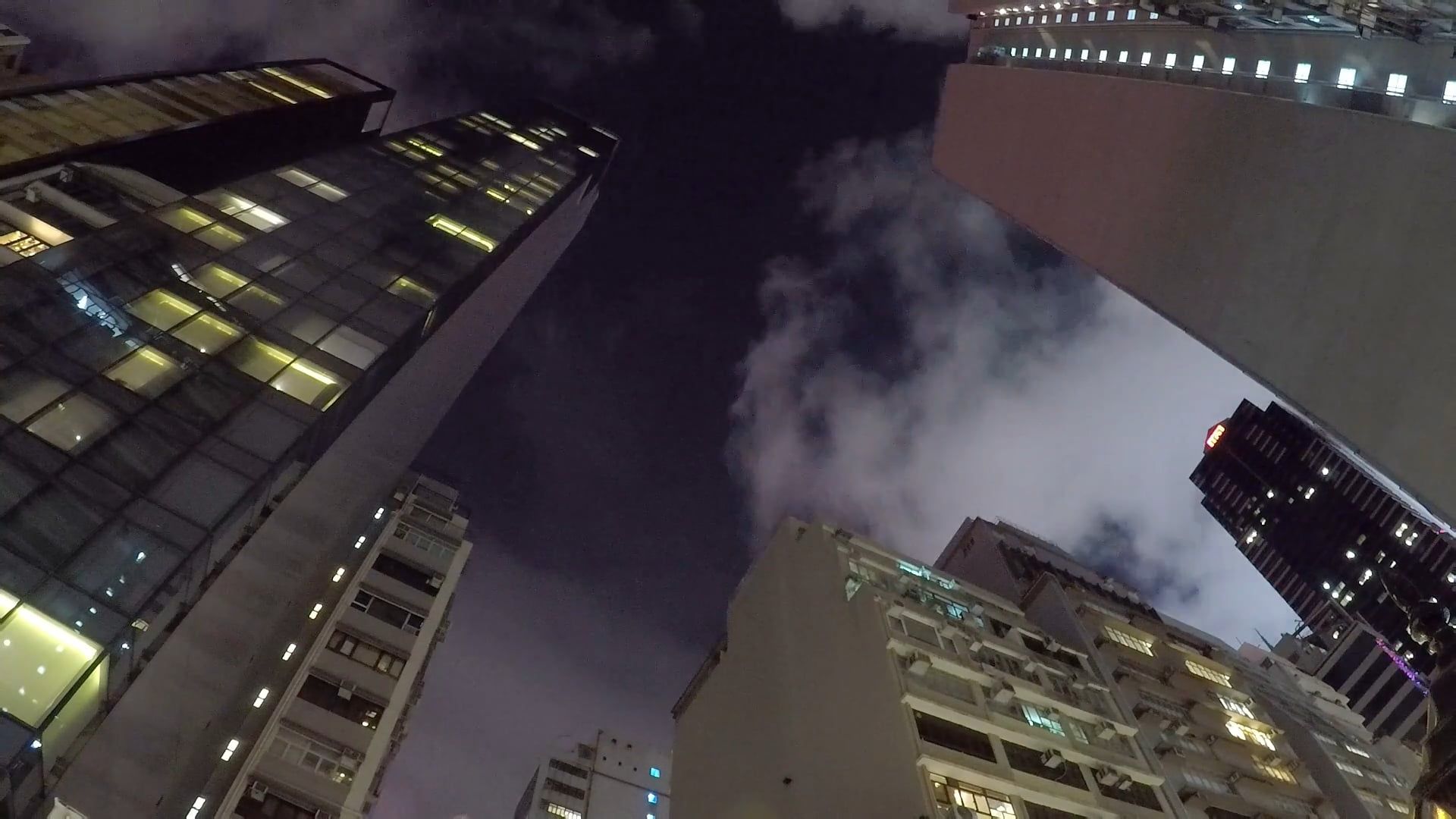 clouds moves by the wind over towering buildings 2852289 — free pexels stock footage