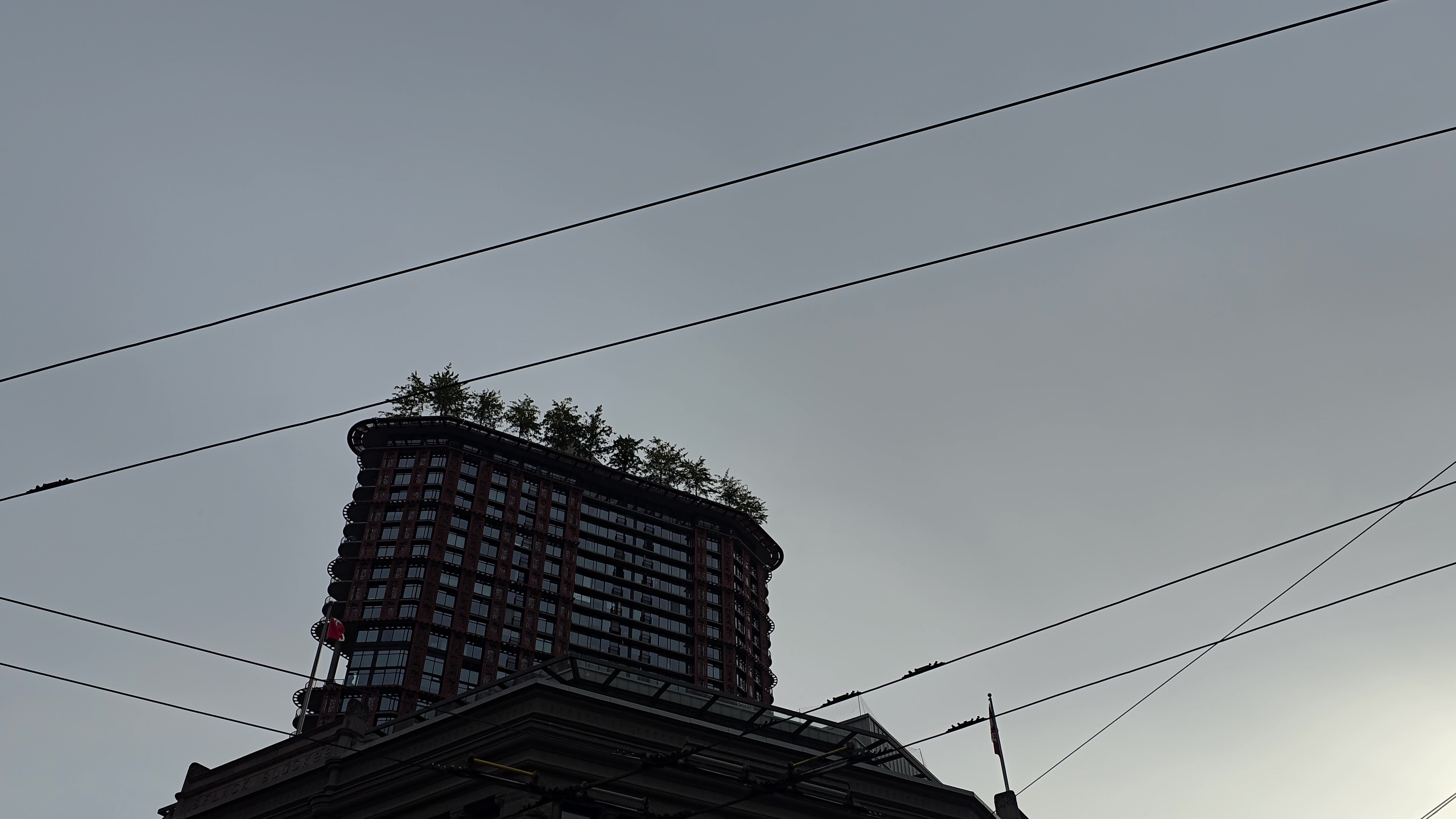 A tall building with a green roof on top Free Stock Video Footage ...