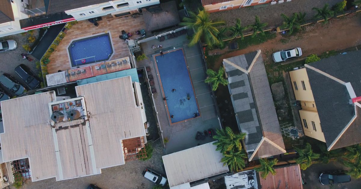 Aerial View of Outdoor Swimming Pools and Buildings Free Stock Video ...
