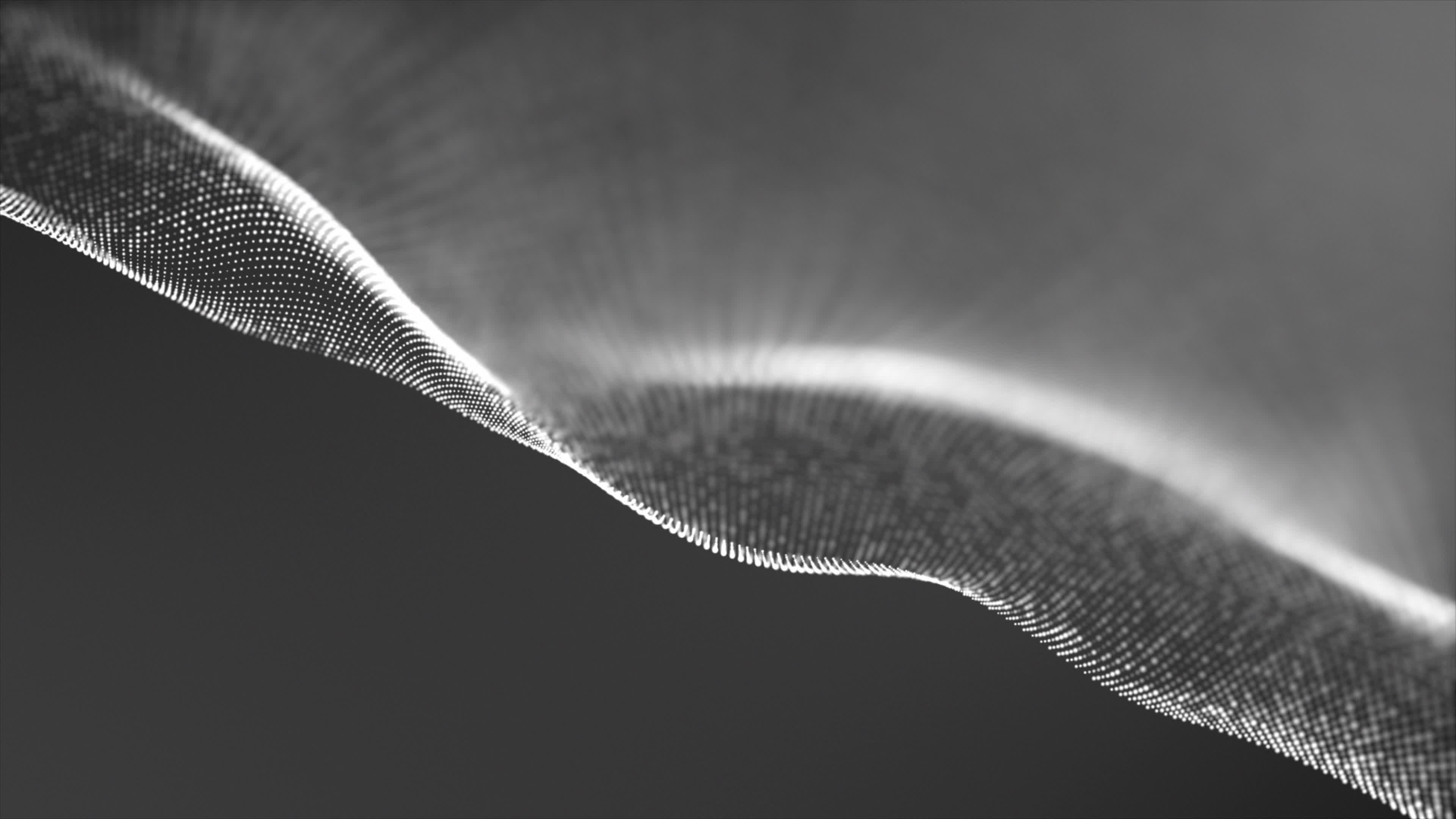 Slow abstract light forms on a dark ground