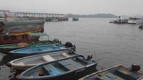 Different Kinds Of Boats On The Dock