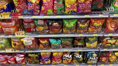 colorful snack aisle in a convenience store