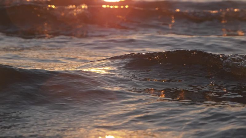 Golden Sunlight Reflecting on Ocean Waves Free Stock Video Footage ...