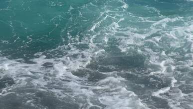 serene ocean waves crashing on sandy beach