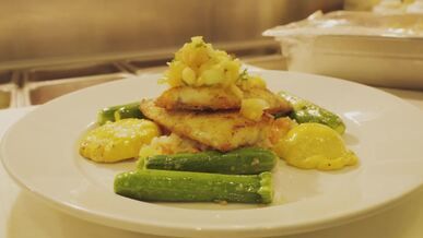 gourmet cod plated with vegetables