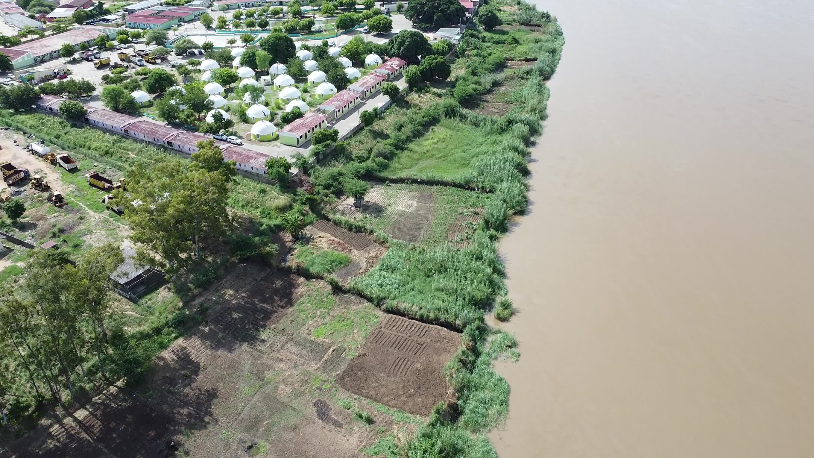 Aerial View of Riverside Settlement Landscape Free Stock Video Footage ...