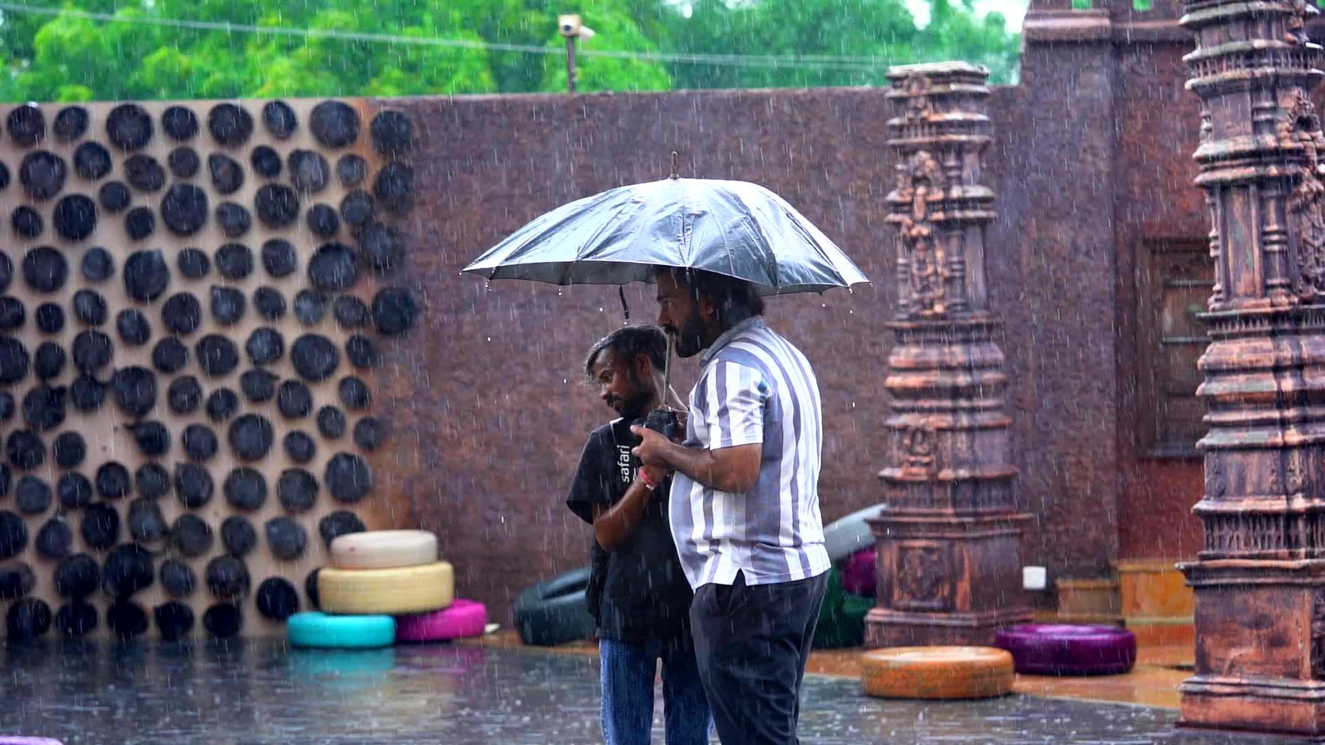 rainy day scene with two people under umbrella 28762470 — free pexels stock footage