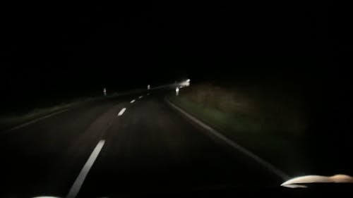 Driving On A Road At Night