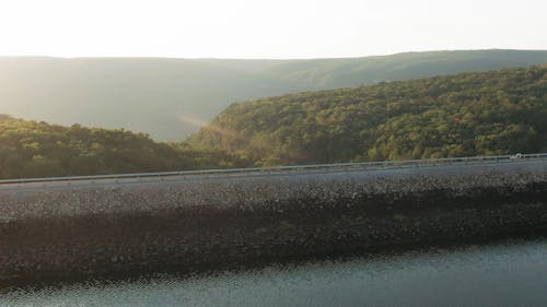 A Road Built On Top Of A Dam Wall