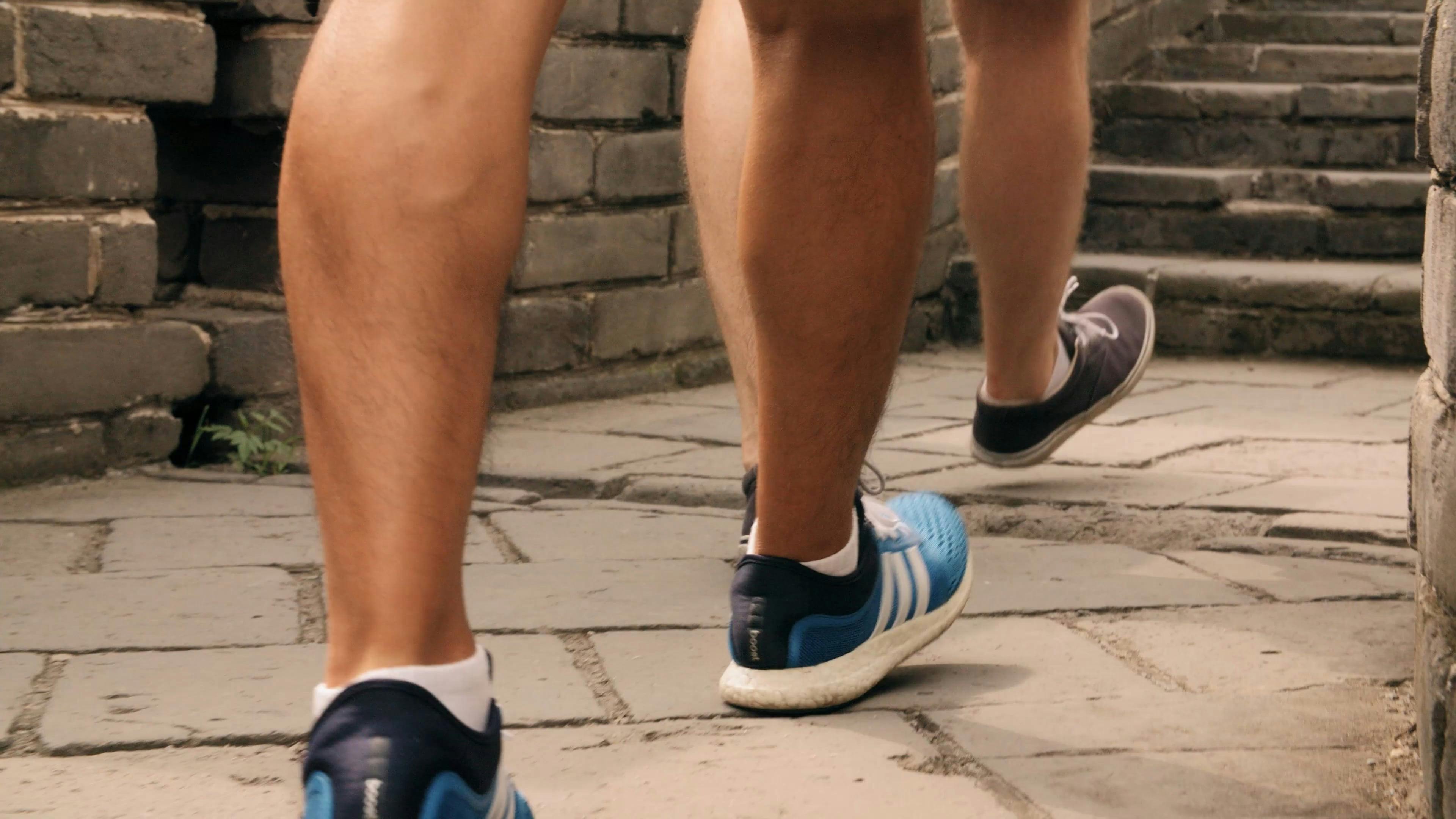 people wearing sneakers
