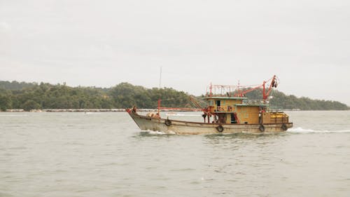 A Fishing Vessel Off To The Sea To Catch Fish 