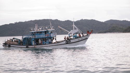 A Fishing Vessel Off To The Sea To Catch Fish 