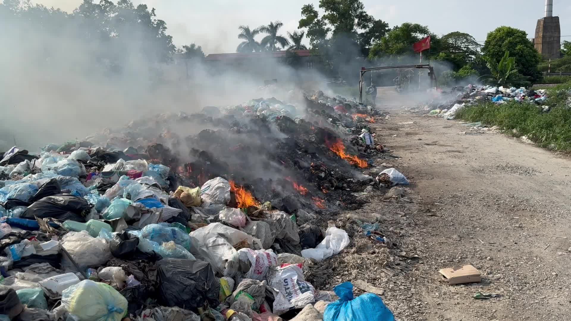 Burning Garbage Piles on Rural Pathway Free Stock Video Footage ...