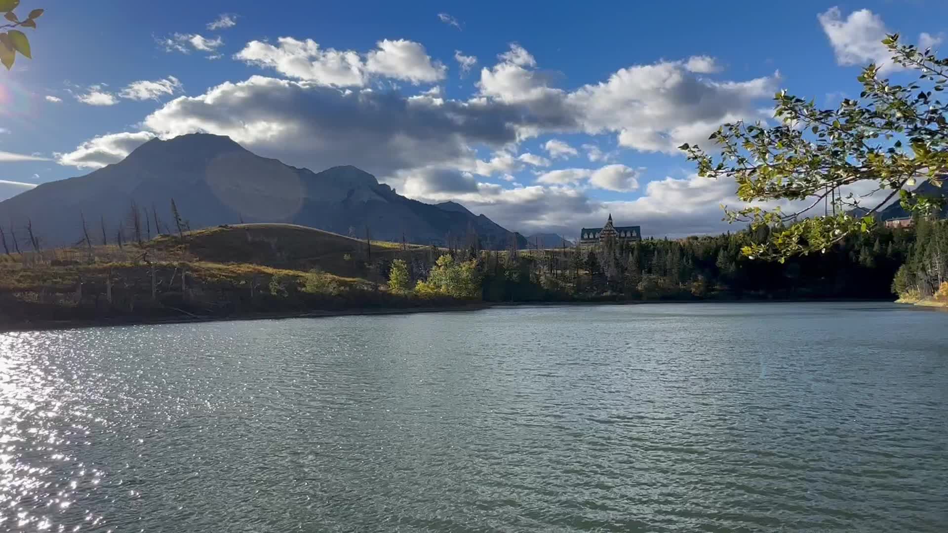 Mountain Lake with Tower in Scenic Landscape Free Stock Video Footage ...