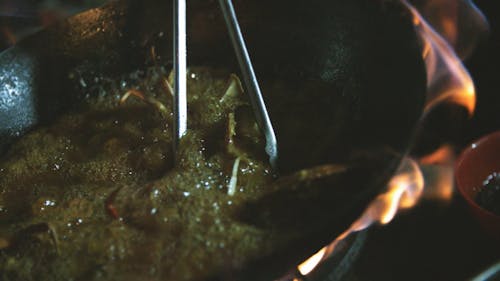 Deep Frying A Crab On A Wok In High Fire