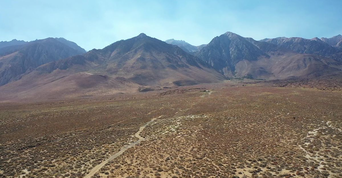 Scenic Aerial View Of Sierra Nevada Mountains Free Stock Video Footage scenic-aerial-view-of-sierra-nevada-mountains-free-stock-video-footage