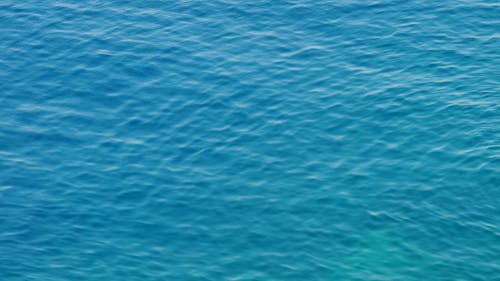 Waves In The Surface Of A Calm Water