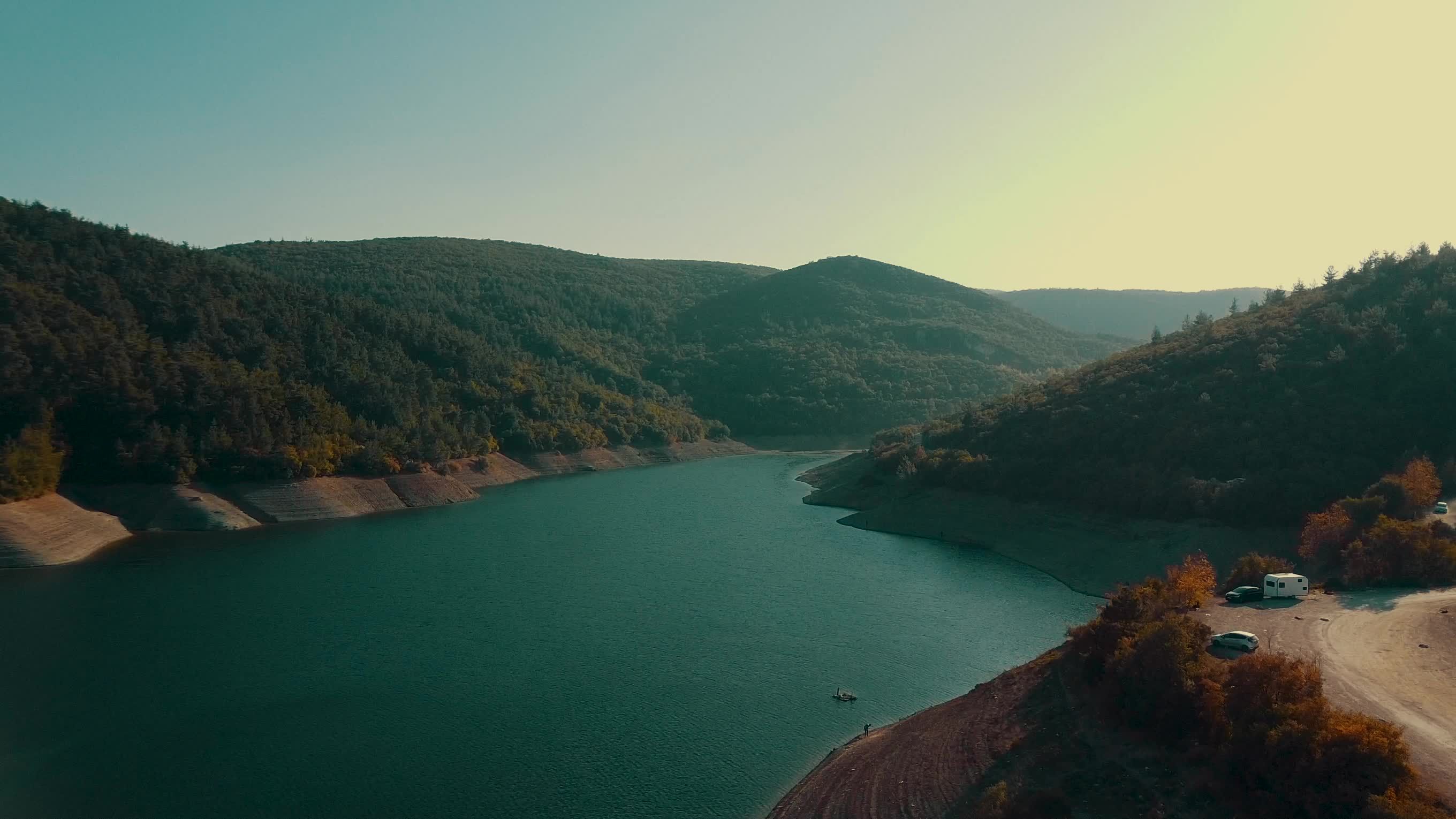 Serene Aerial View of Forested Lake in Autumn Free Stock Video Footage ...