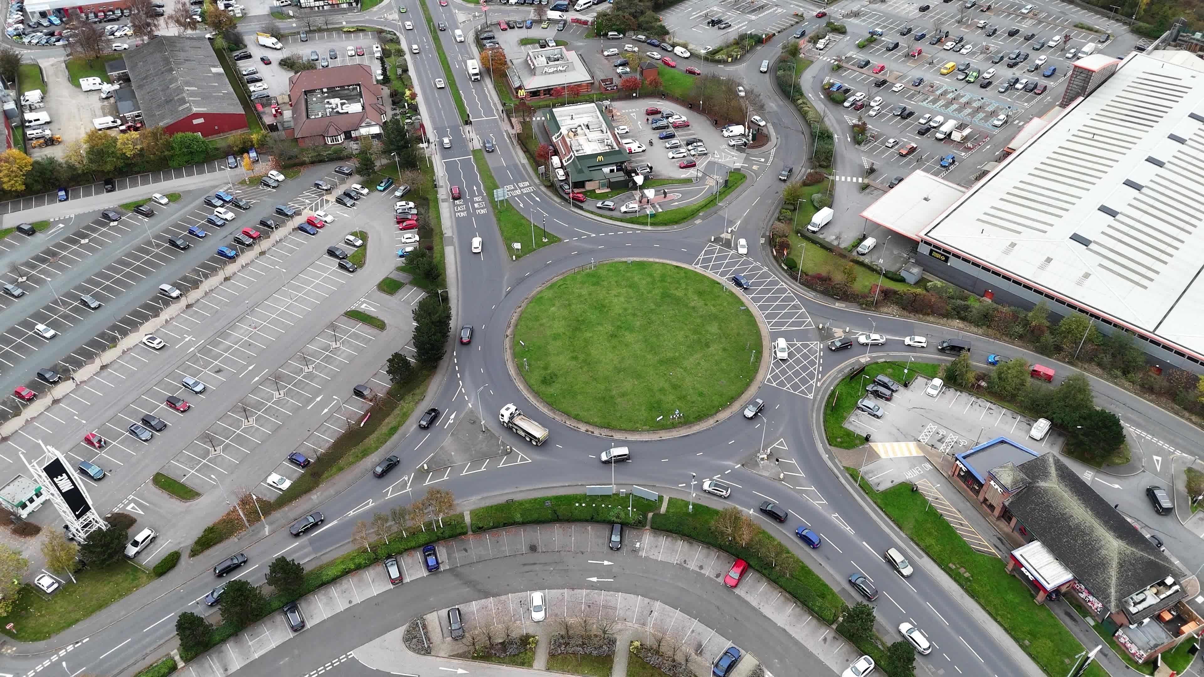 Aerial View of Urban Traffic Roundabout Scene Free Stock Video Footage ...