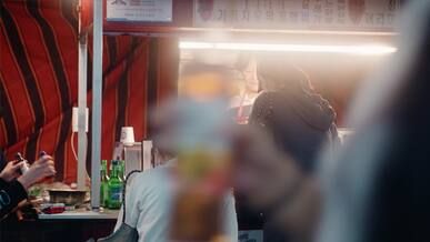 night market food stall scene in urban setting