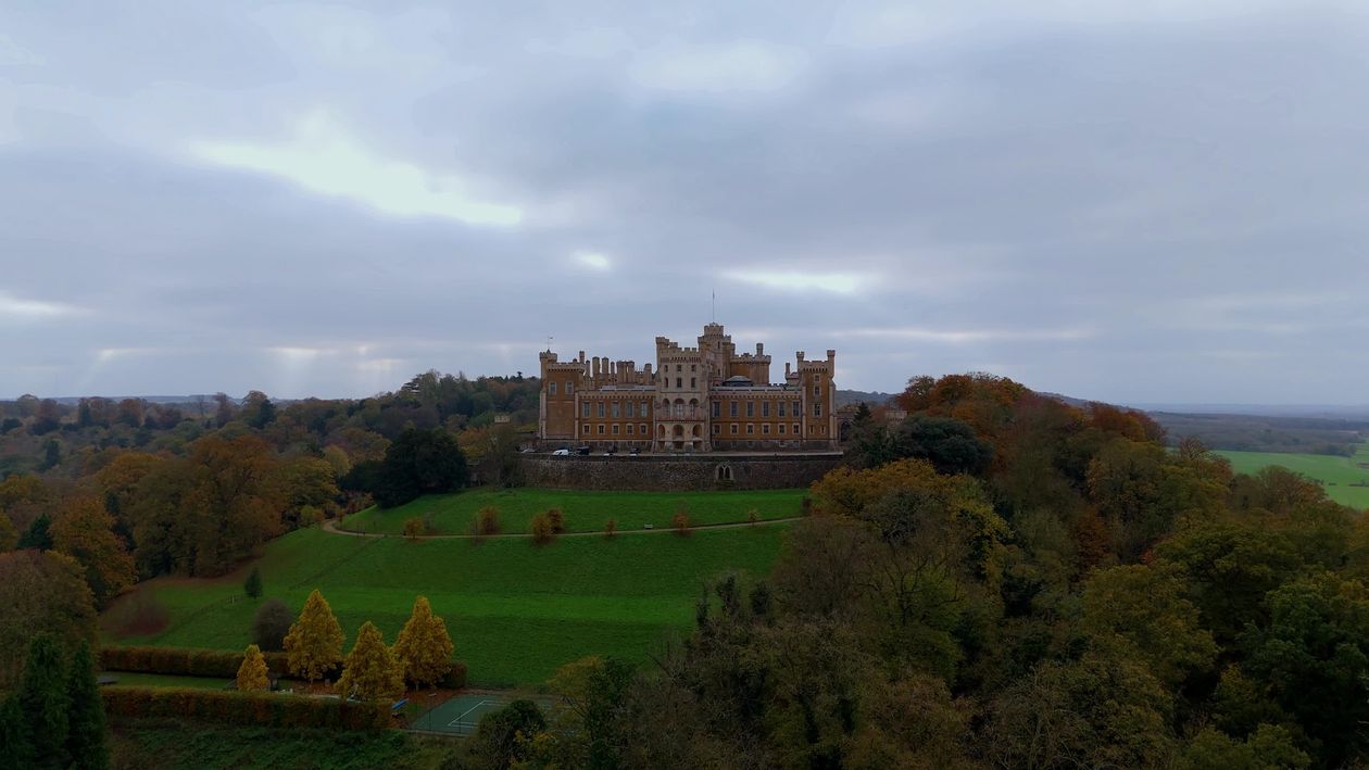 Aerial View of Historic Castle Surrounded by Autumn Foliage Free Stock ...