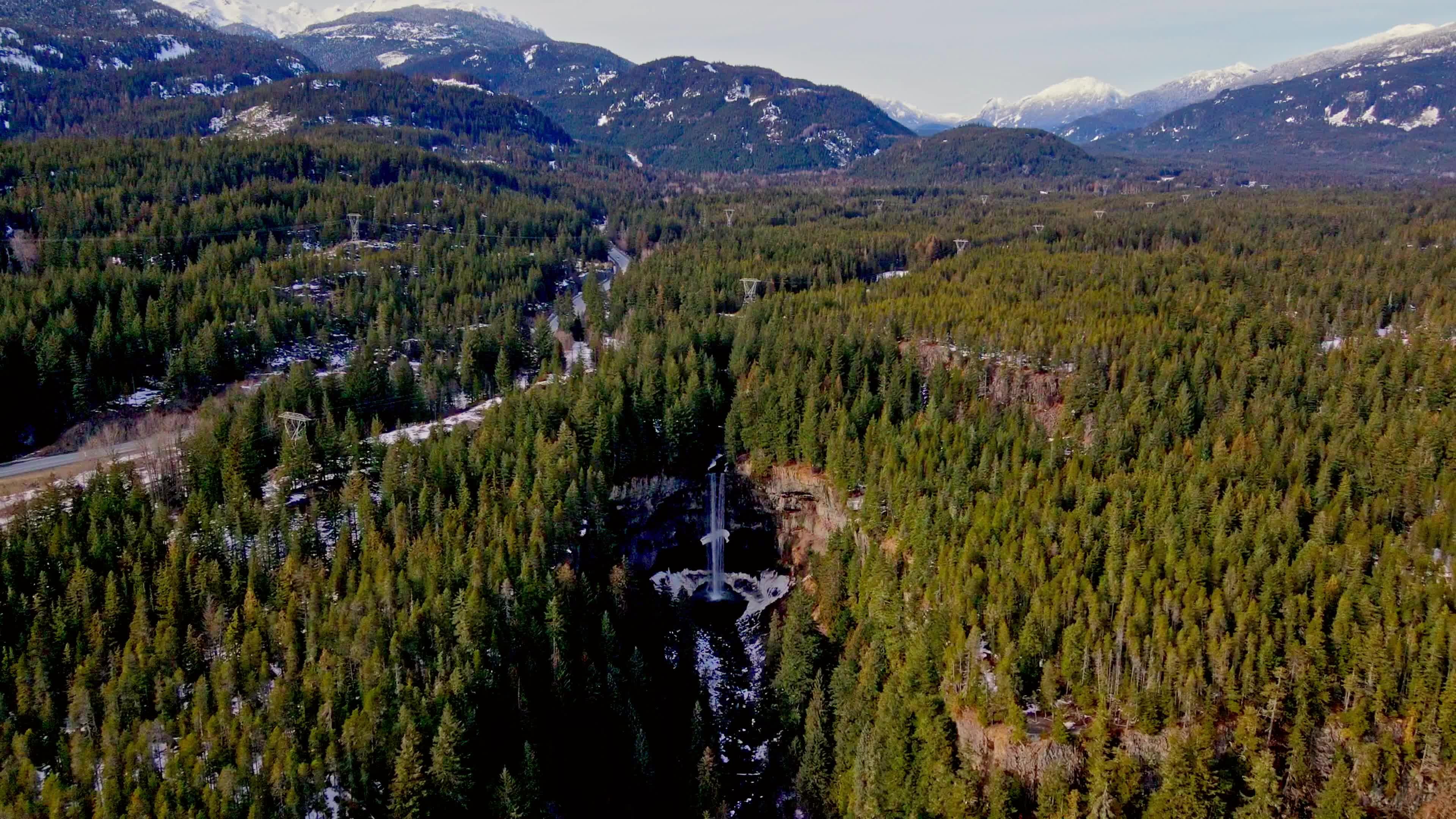 Aerial View of Forests and Snowy Mountains Free Stock Video Footage ...