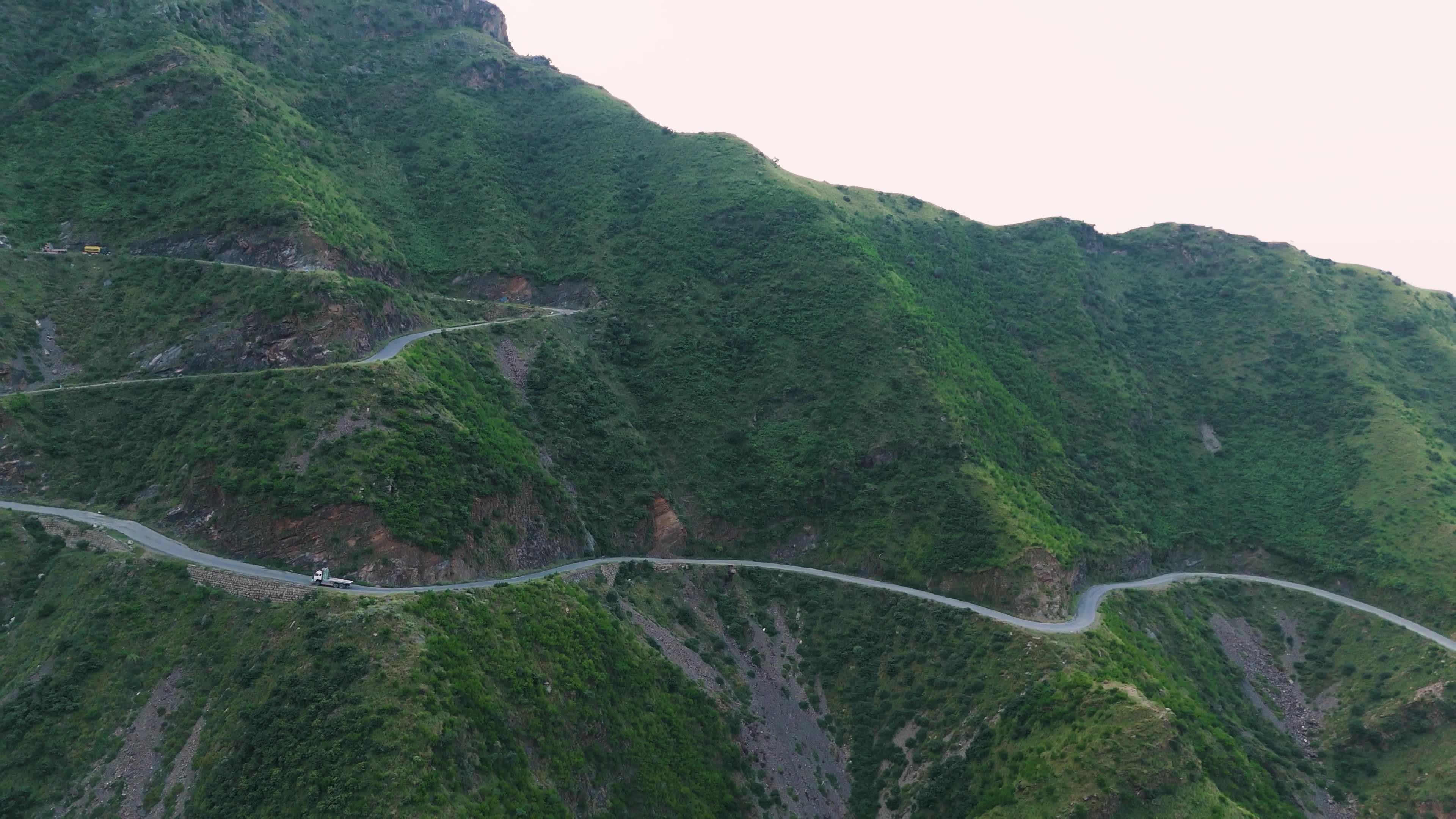 Stunning Aerial View of Lush Mountain Road Free Stock Video Footage ...