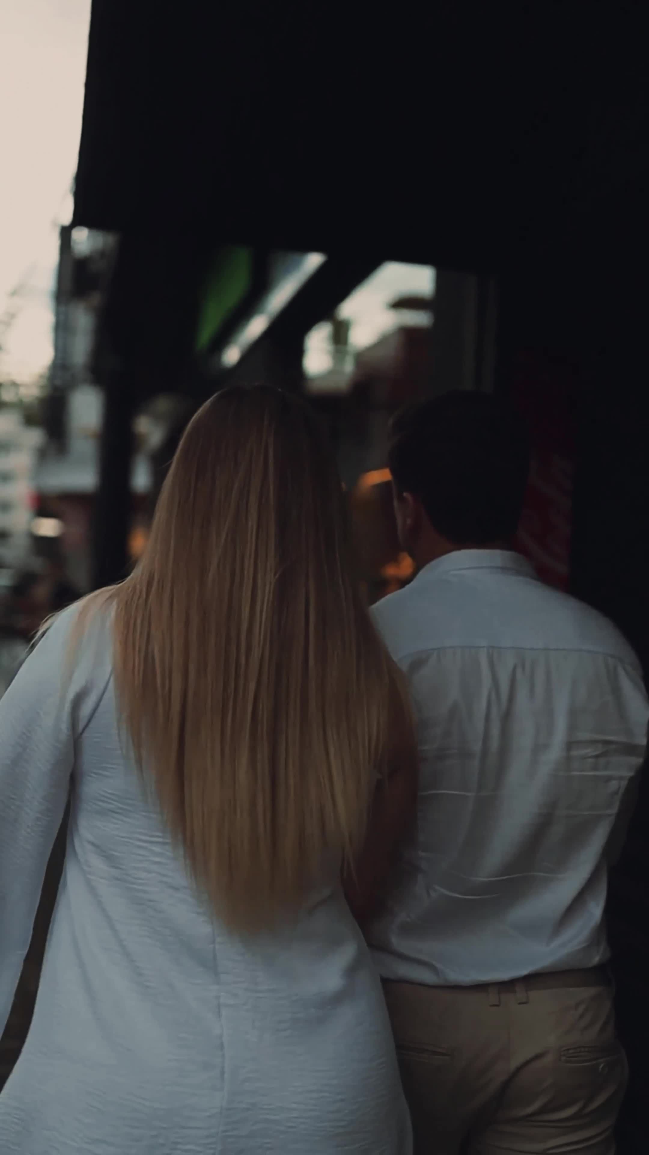 couple strolling on bustling city street 29436698 — free pexels stock footage