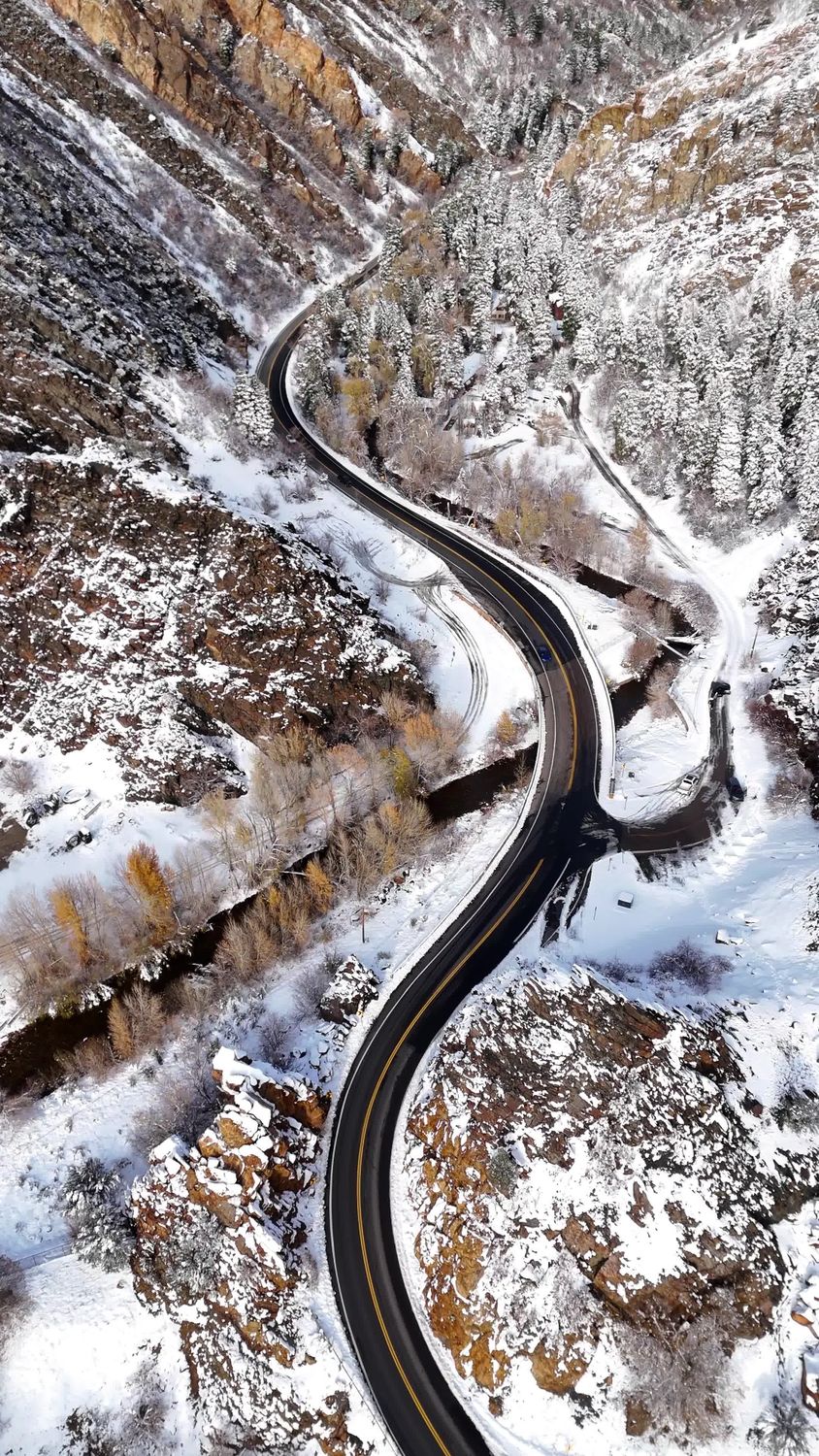 Aerial View of Snowy Mountain Highway in Winter Free Stock Video ...