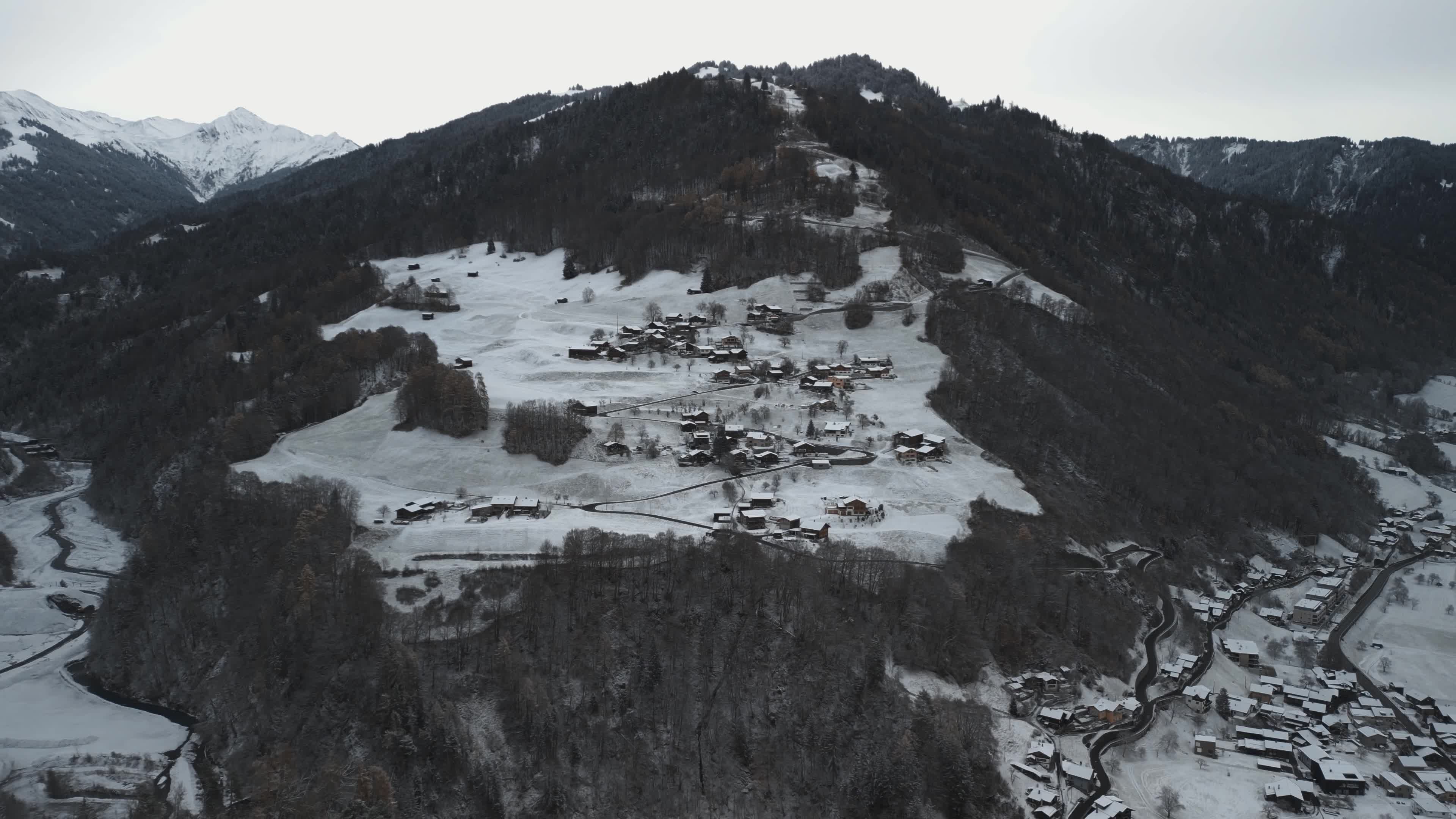 Aerial View of Snowy Alpine Village in Winter Free Stock Video Footage ...