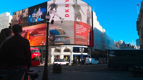 Low Angle Footage Of Picadilly Circus Road Junction In Daylight